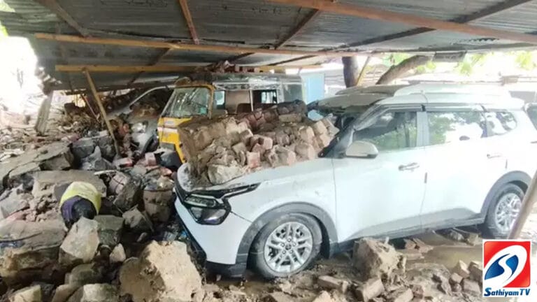 கனமழையால் இடிந்து விழுந்த பார்க்கிங் சுவர்..சொகுசு கார்கள் சேதம்..!!